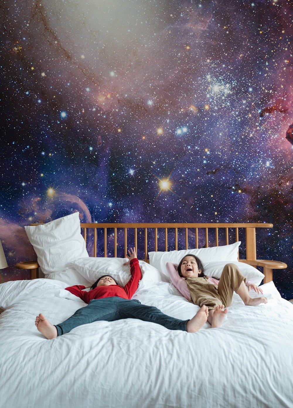 Wallpaper mural with a lovely purple galaxy design for the bedroom.