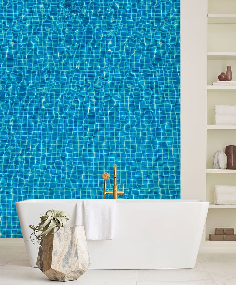 Wallpaper mural featuring a swimming pool with ripples, perfect for use in the bathroom.