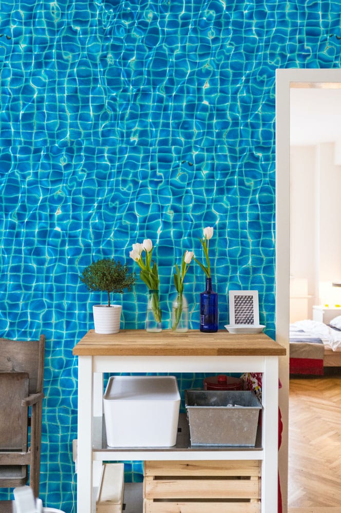 Wallpaper mural featuring swimming pool ripples, perfect for use in the hallway.