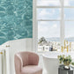 Wallpaper mural with turquoise ocean waves, perfect for use as bathroom decor.