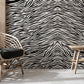Pick up a dense black animal fur wallpaper mural to use for the décor of the hallway.