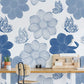 Flower and butterfly wallpaper for the room in a distinctive blue line drawing.