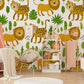 Baby nursery with lion and cheetah prints on the walls.
