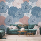 For the living room, a blend of blue and pink floral wallpaper