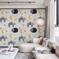animal print wallpaper with a dozing cat and a crescent moon