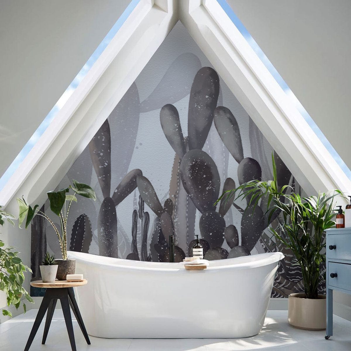 A watercolour cactus design was printed as a mural on wallpaper and installed in the bathroom.