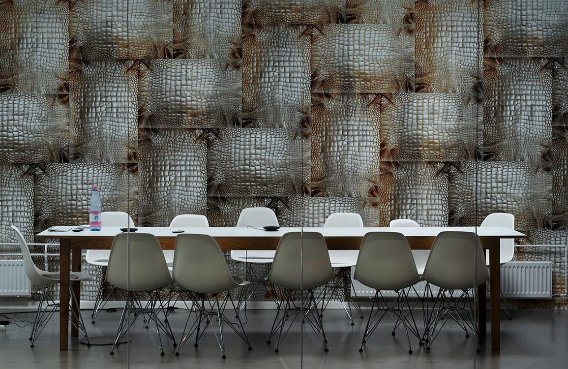 Wallpaper mural with a brown snakeskin knit pattern, perfect for decorating an office.