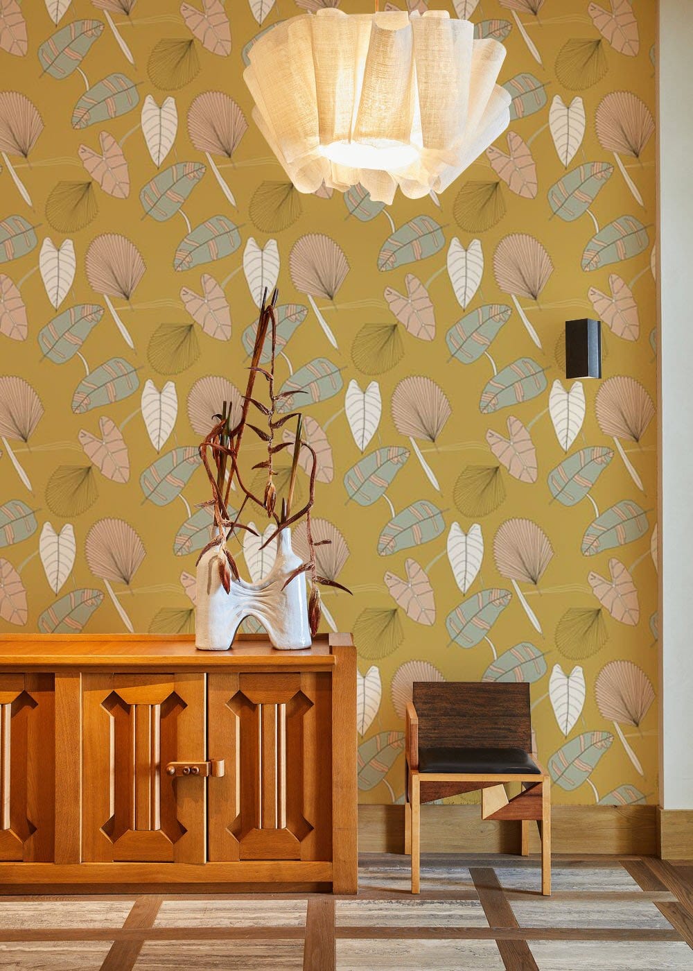 Wallpaper mural with a variety of leaves decorating the living room