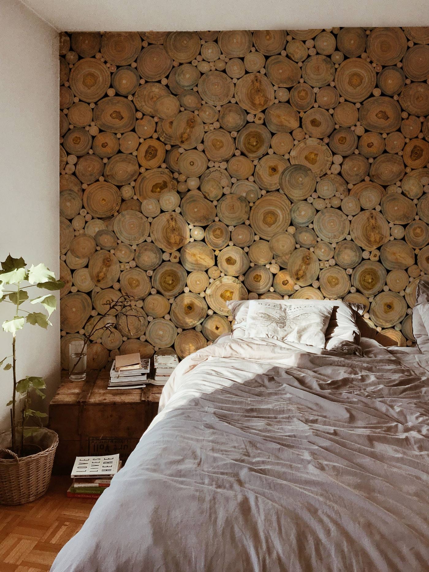 Wallpaper mural with a wood-grain pattern that may be used for decorating a bedroom.
