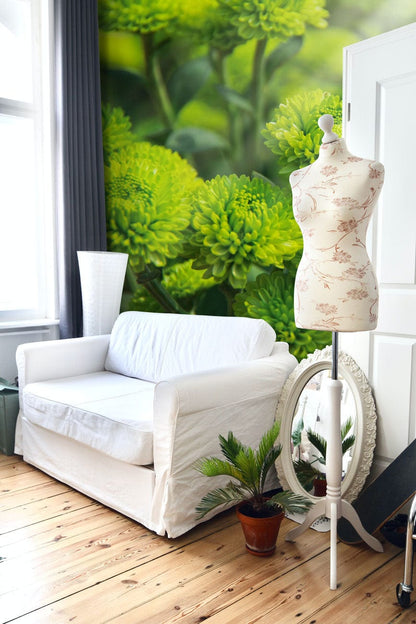 Wallpaper mural with vivid green plants, perfect for decorating the living room.