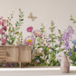 Wallpaper with a delicate floral meadow design for the living room decor