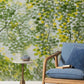Wallpaper mural featuring a watercolor painting of spring trees for use in decorating the hallway