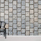 The living room wallpaper mural has a whitewash brick effect pattern.