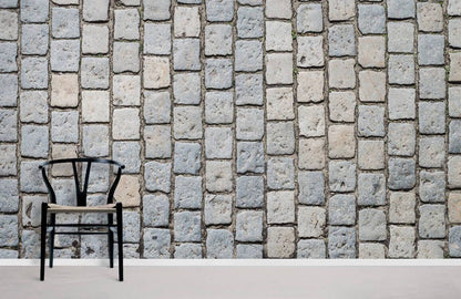 The living room wallpaper mural has a whitewash brick effect pattern.